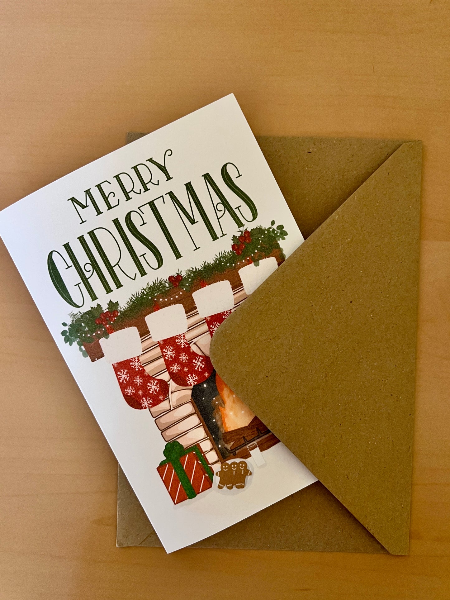 Cosy Fireplace Christmas Card – Festive Mantel with Stockings and Gifts